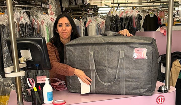 Staff with laundry bag